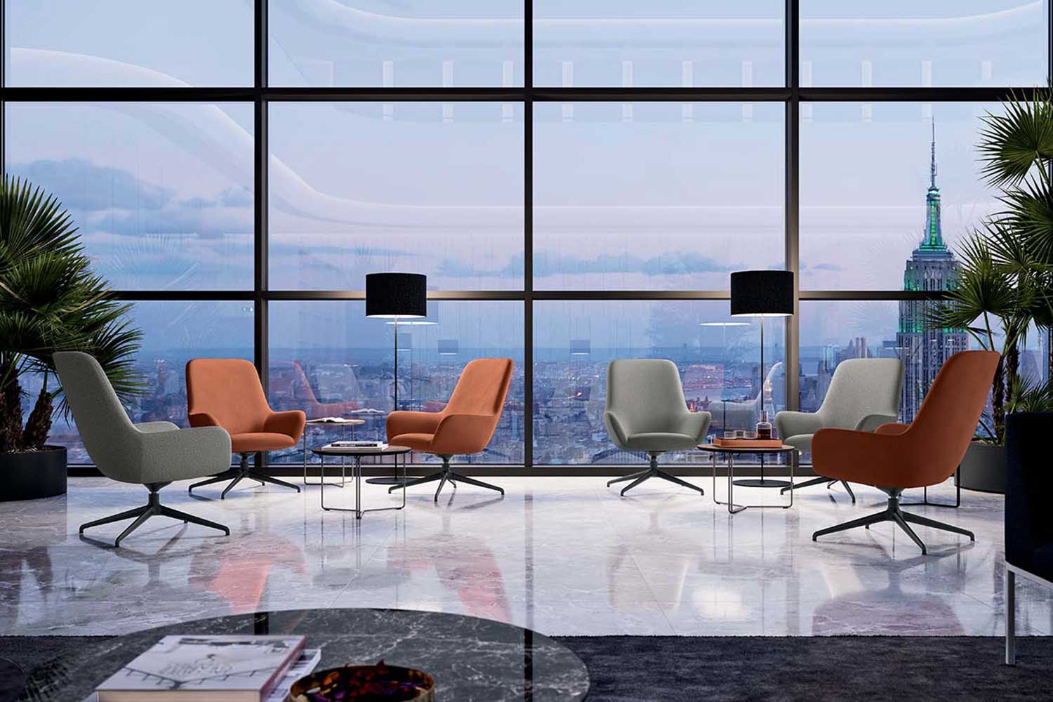 Area lounge di un ufficio moderno con poltroncine e vista sulla città